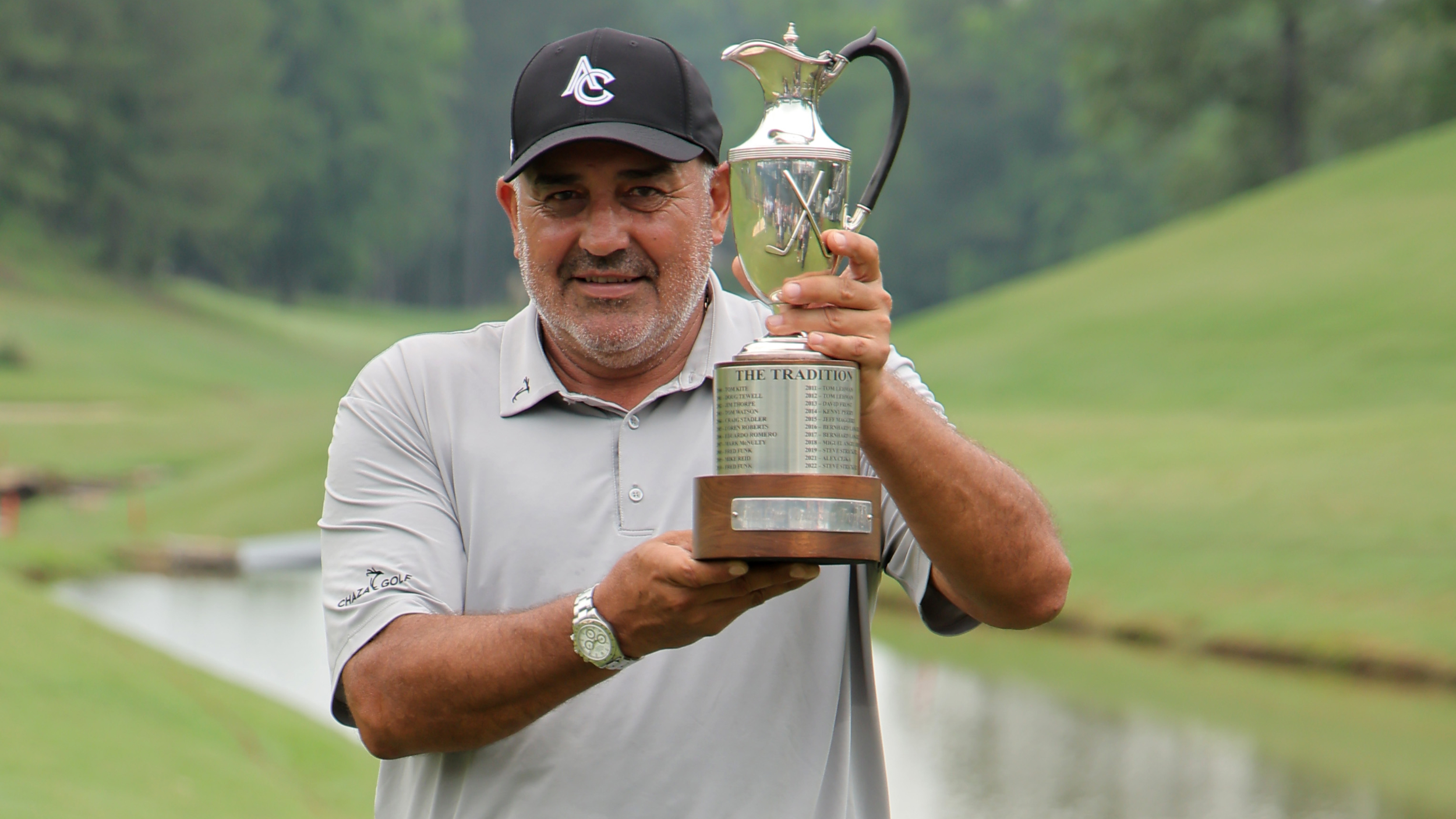 Angel Cabrera holding the Regions Tradition trophy