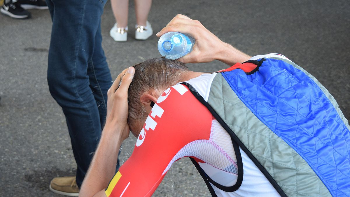 Tim Wellens uses an ice jacket and cool water to keep his body temperature down