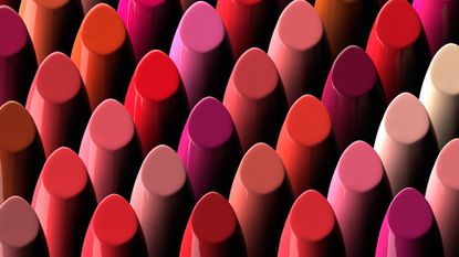 assortment of different colored lipsticks