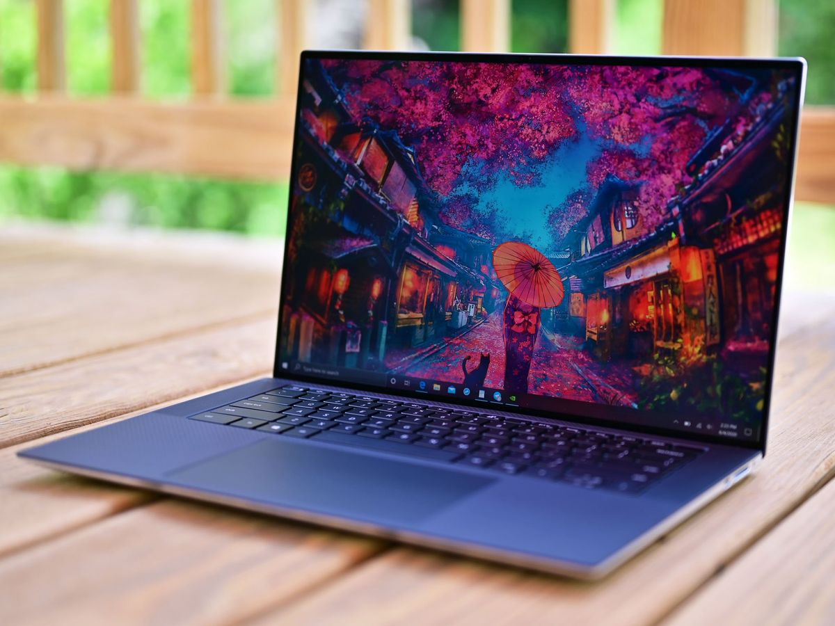 Hero shot of Dell XPS 15 on a wooden deck