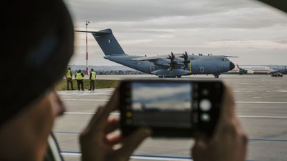 Woman photographs Poland's Rzeszów-Jasionka Airport