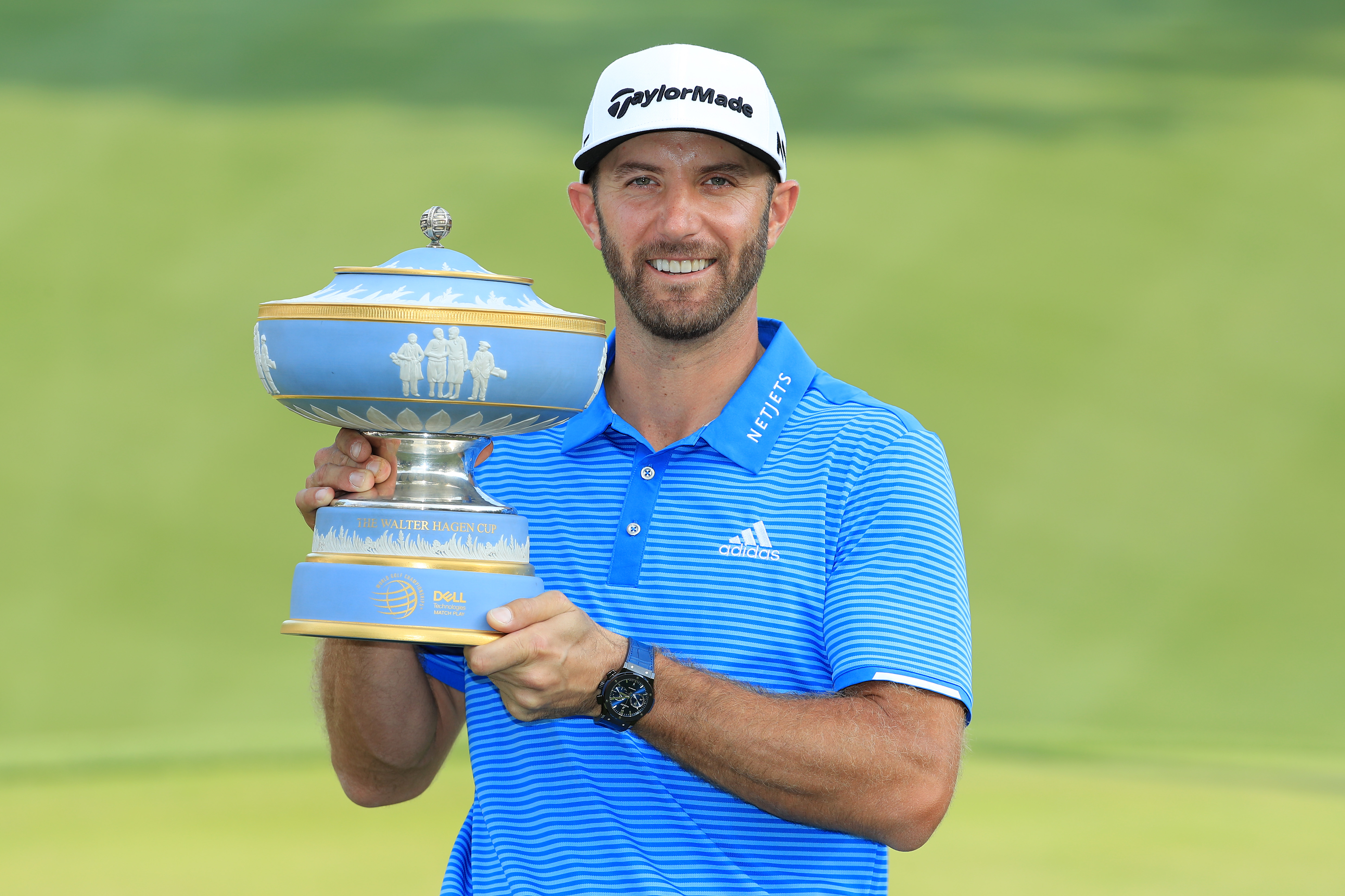 Dustin Johnson holds the WGC-Dell Technologies Match Play trophy