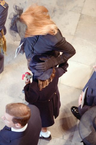 Sarah Ferguson and Princess Eugenie at Diana's funeral