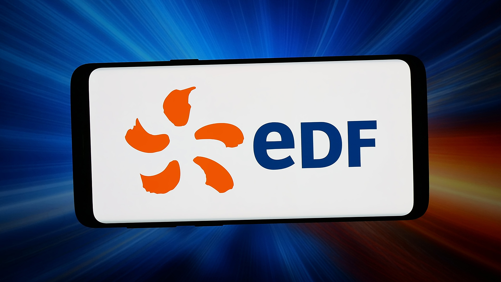 The EDF logo shown on a smartphone in front of an abstract background of beams of light.