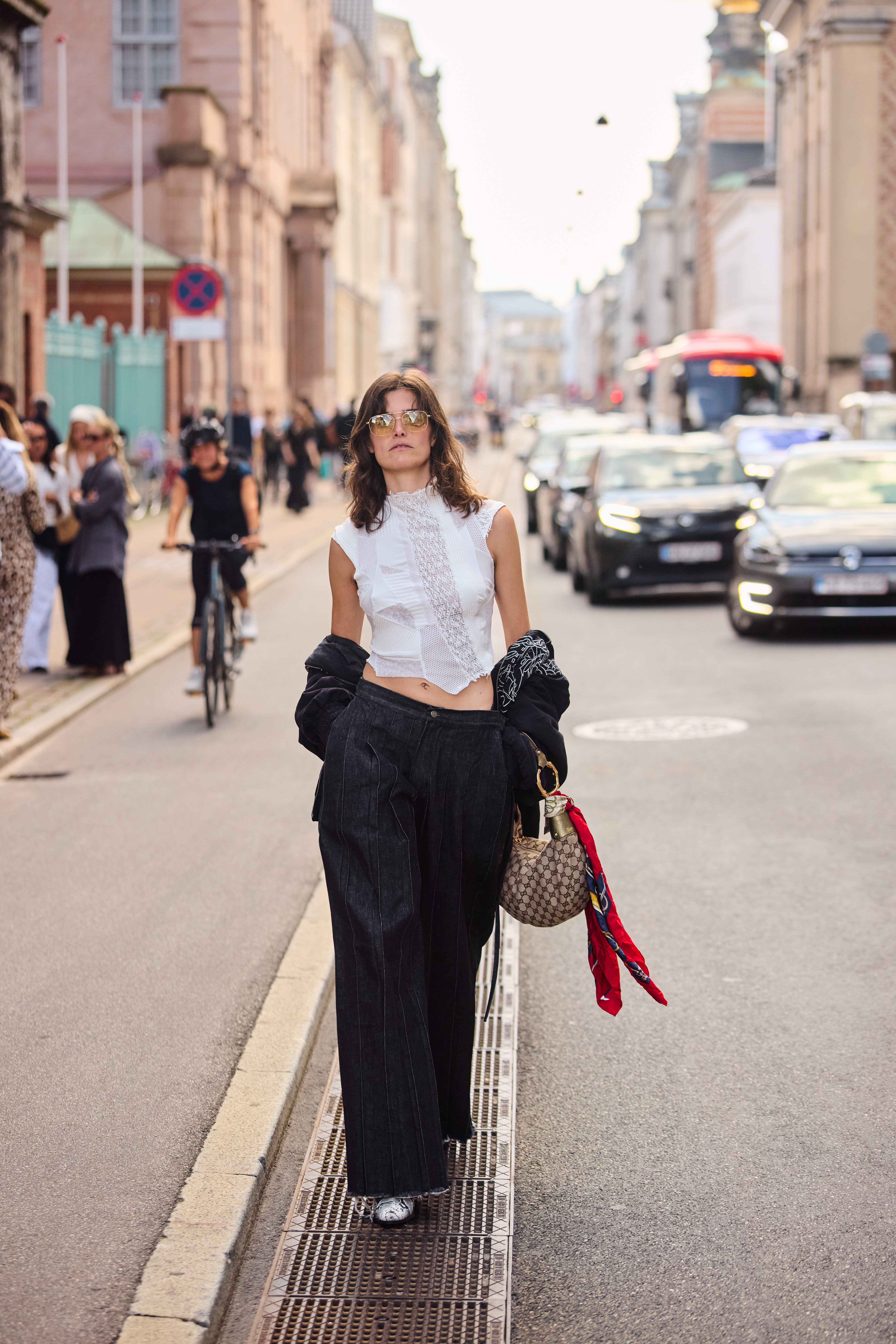 Copenhagen Fashion Week attendees wear animal print shoes.