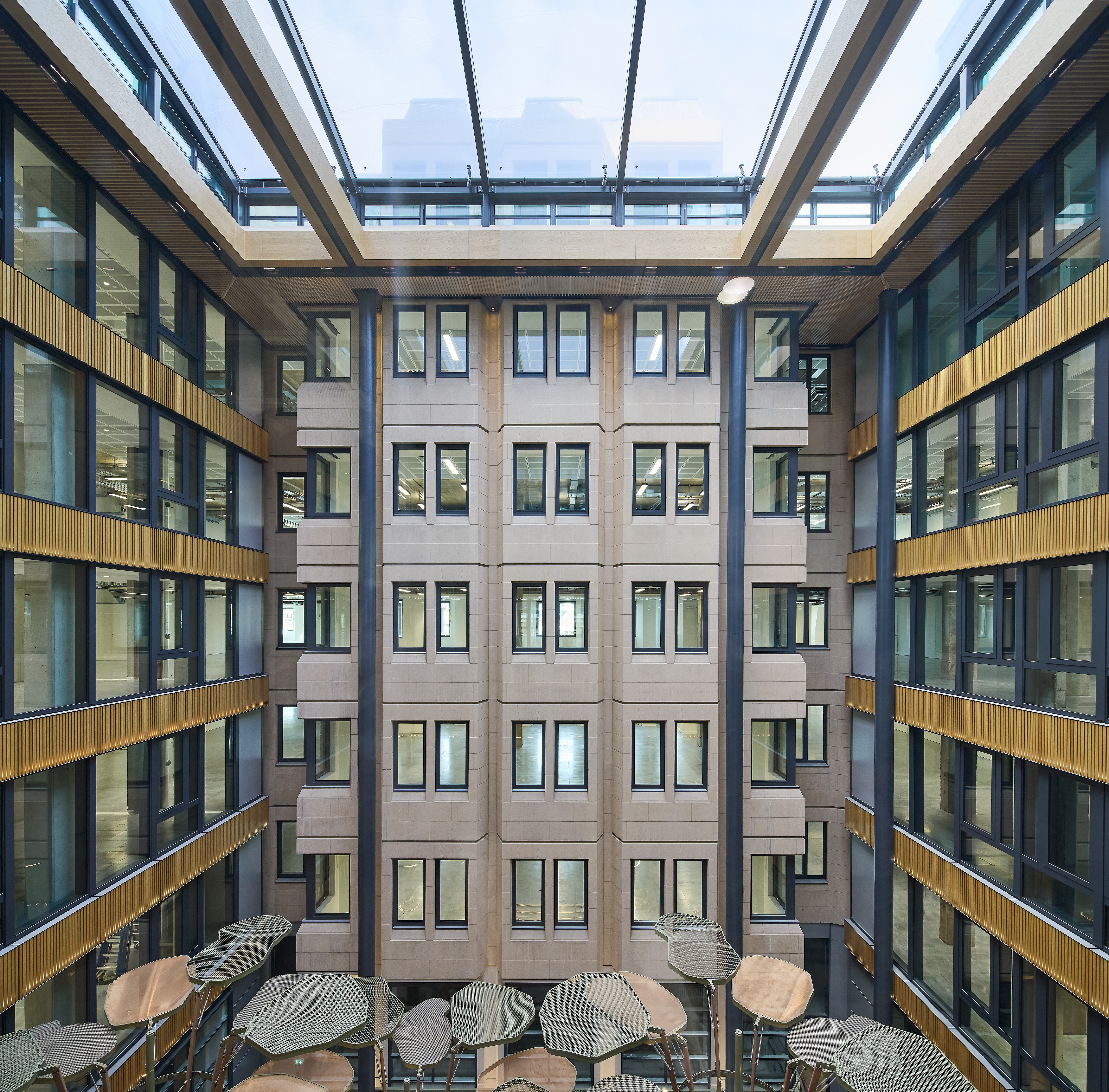 The Acre, atrium interior in renovated brutalist Richard Seifert building in London