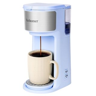 Baby blue Ranbomer single serve coffee make with cream mug on tray