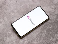 The Mindtree logo on a smartphone