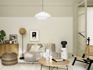 Japandi living room scheme with white painted floorboards