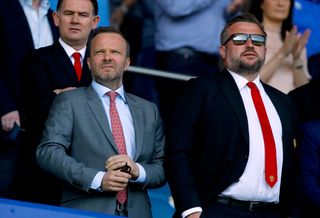 Departing executive vice-chairman Ed Woodward (left) and new Manchester United chief executive Richard Arnold