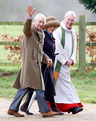 King Charles III and Queen Camilla, accompanied by The Reverend Canon Dr Paul Williams, attend the Sunday service at the Church of St Mary Magdalene on the Sandringham estate on February 4, 2024 in Sandringham, England.