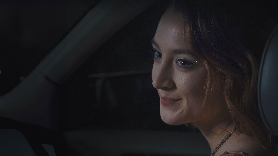 Saoirse Ronan in the front seat of a car in Lady Bird