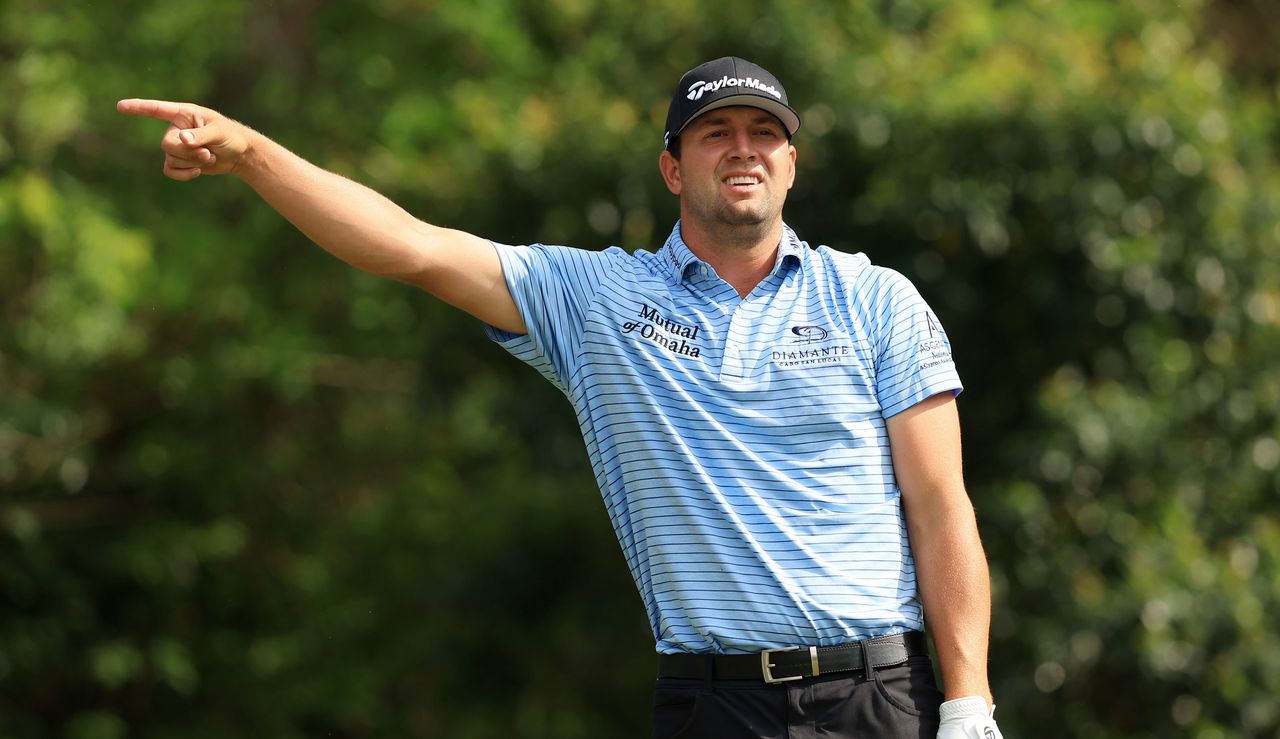 Montgomery points right whilst watching his tee shot