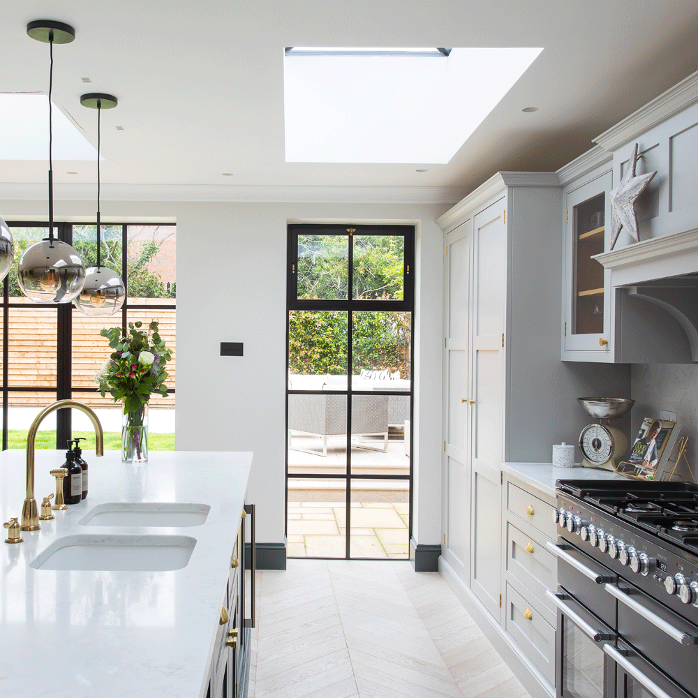 thirties house with skylight and steel framed doors and kitchen island