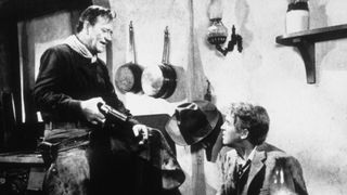 John Wayne and Jimmy Stewart in The Man Who Shot Liberty Valance