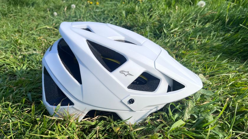 Alpinestars Vector Tech Solid helmet seen side on placed on grass