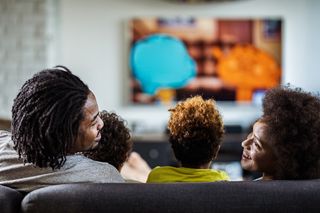 Family watching TV 