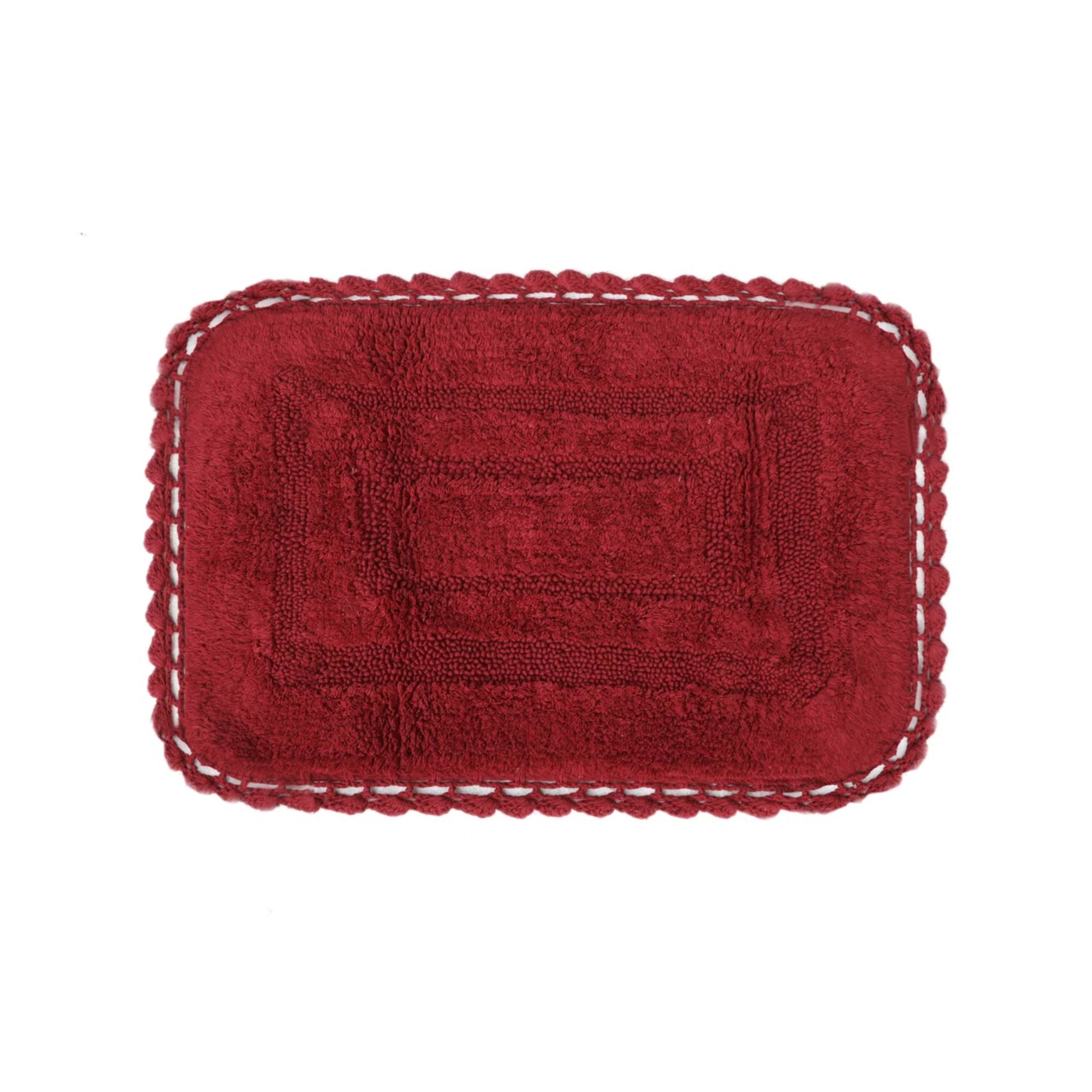 Red bath mat with scalloped trim