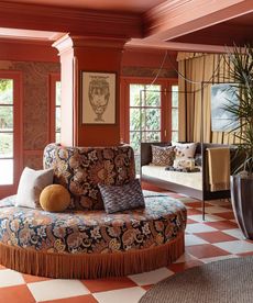 pink pool room with circular couch