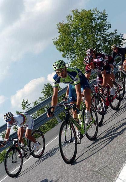 Liquigas veteran Andrea Noe rides alongside Paolo Bettini (Quick.Step).