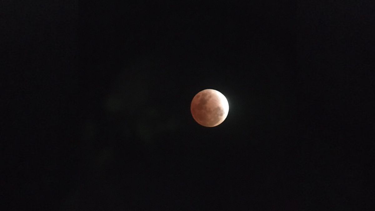 Stunning photos of the longest partial lunar eclipse of the century ...