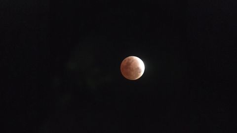 Stunning Photos Of The Longest Partial Lunar Eclipse Of The Century 