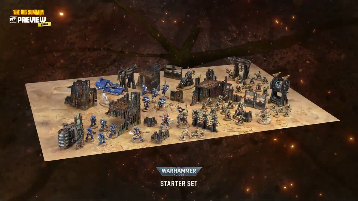 Warhammer 40K Starter Set with models and terrain laid out on a dusty battlefield