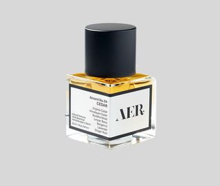 square glass bottle of aer perfume