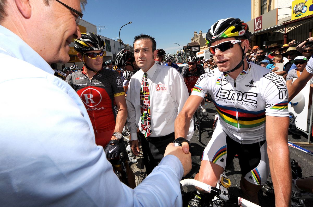 Cadel Evans shakes the hand of then PM Kevin Rudd in 2010