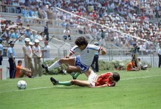 France's William Ayache is fouled by a Hungarian player at the 1986 World Cup in Mexico.