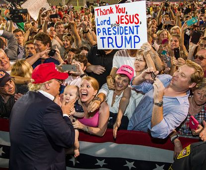 Trump supporters at a presidential rally in Mobile, AL.
