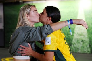 Sam Kerr of Australia celebrates with her partner Kristie Mewis of USA after her team's victory through the penalty shoot out in the FIFA Women's World Cup Australia & New Zealand 2023 Quarter Final match between Australia and France at Brisbane Stadium on August 12, 2023 in Brisbane / Meaanjin, Australia.