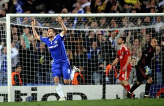 Frank Lampard, left, celebrates scoring against Liverpool