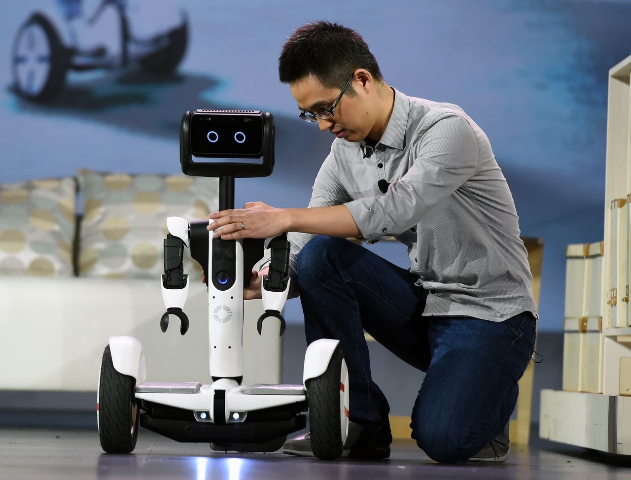 LAS VEGAS, NV - JANUARY 05:Arms are affixed to a self-balancing Ninebot Segway personal transportation robot during a keynote address by Intel Corp. CEO Brian Krzanich at CES 2016 at the The