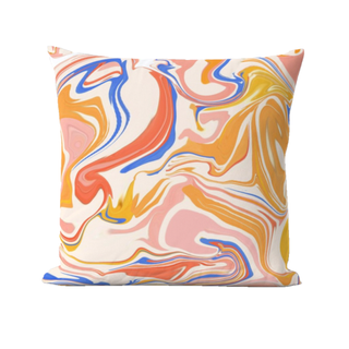 A pastel rainbow marble throw pillow