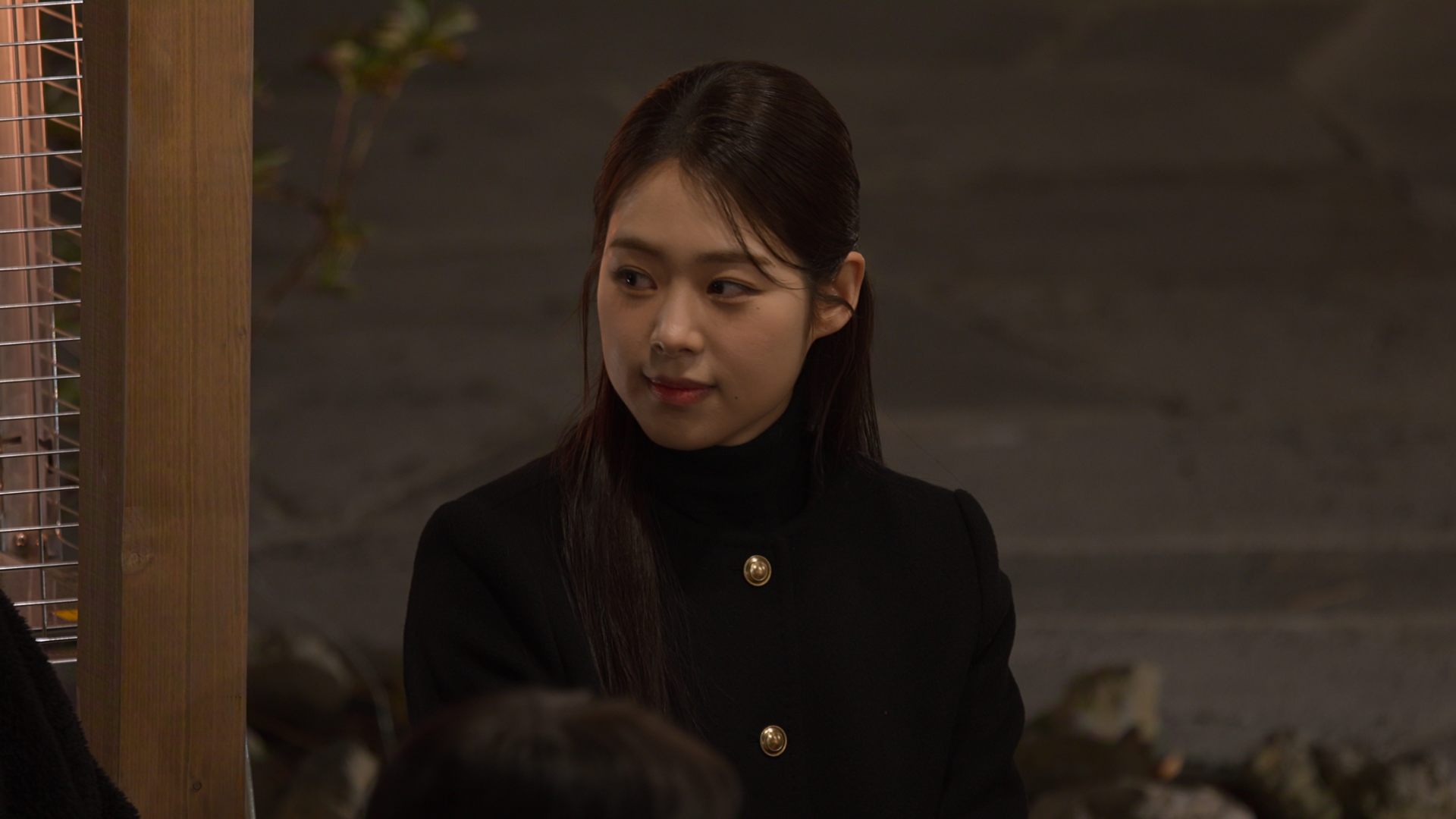 Contestant Su-ji, wearing a coat with gold buttons, on Netflix's 'Better Late Than Single.'