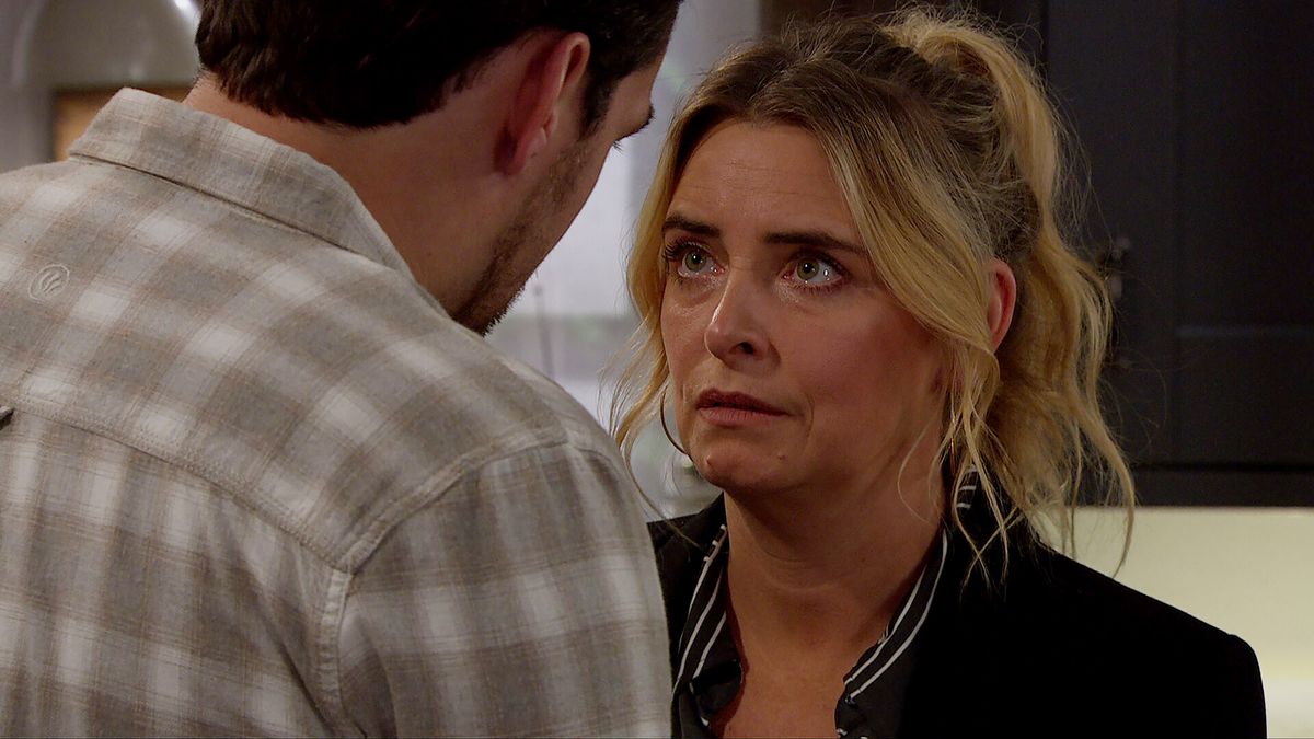 Charity looks at Mack with a worried look on her face in Emmerdale. 