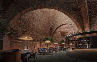 50% Cloud Aritsts Lounge interior showing brick arches