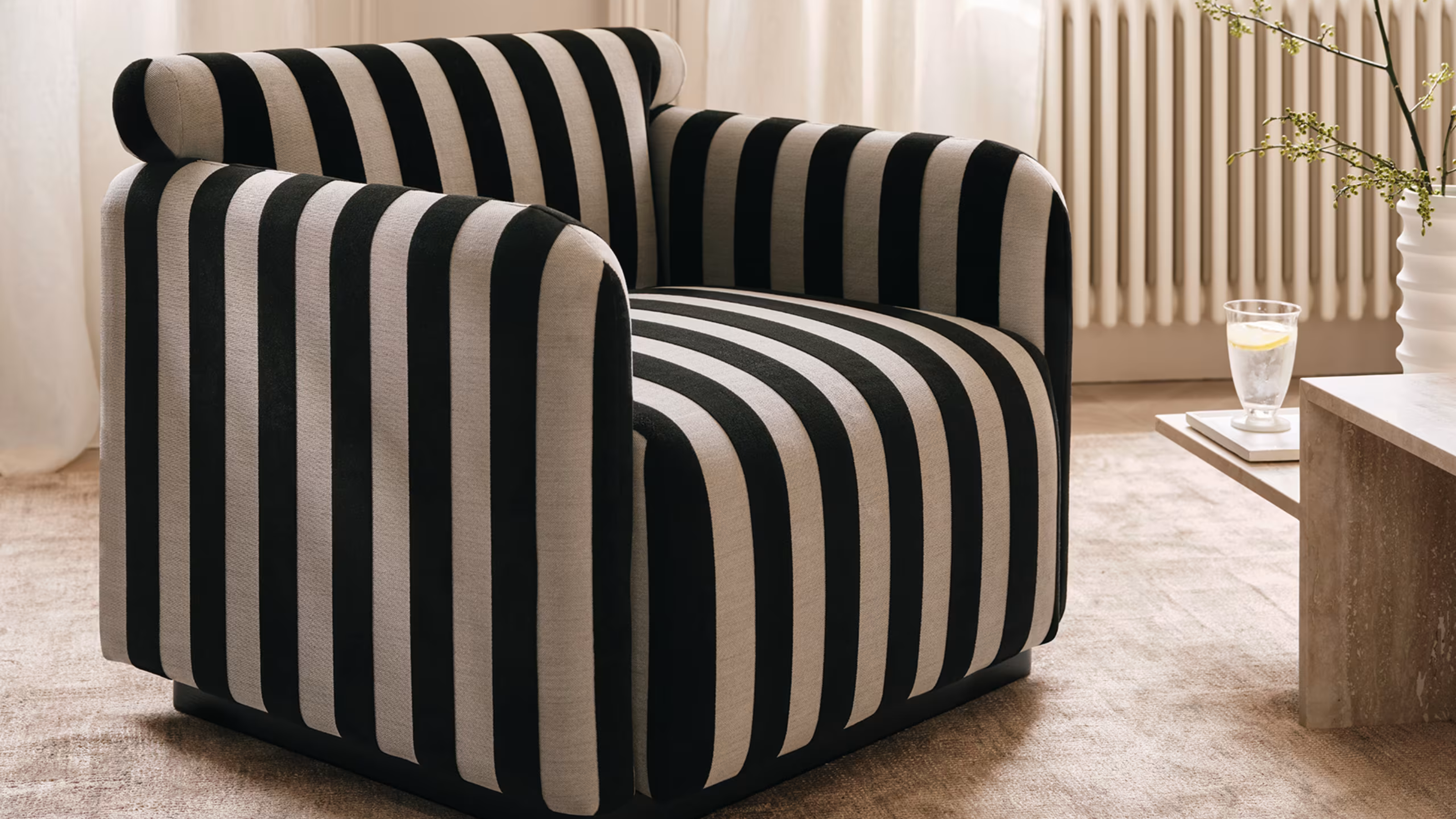 M&amp;S x Kelly Hoppen Striped Accent Chair in a modern, neutral living room.