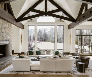 Large cozy lounge area with high wooden beams