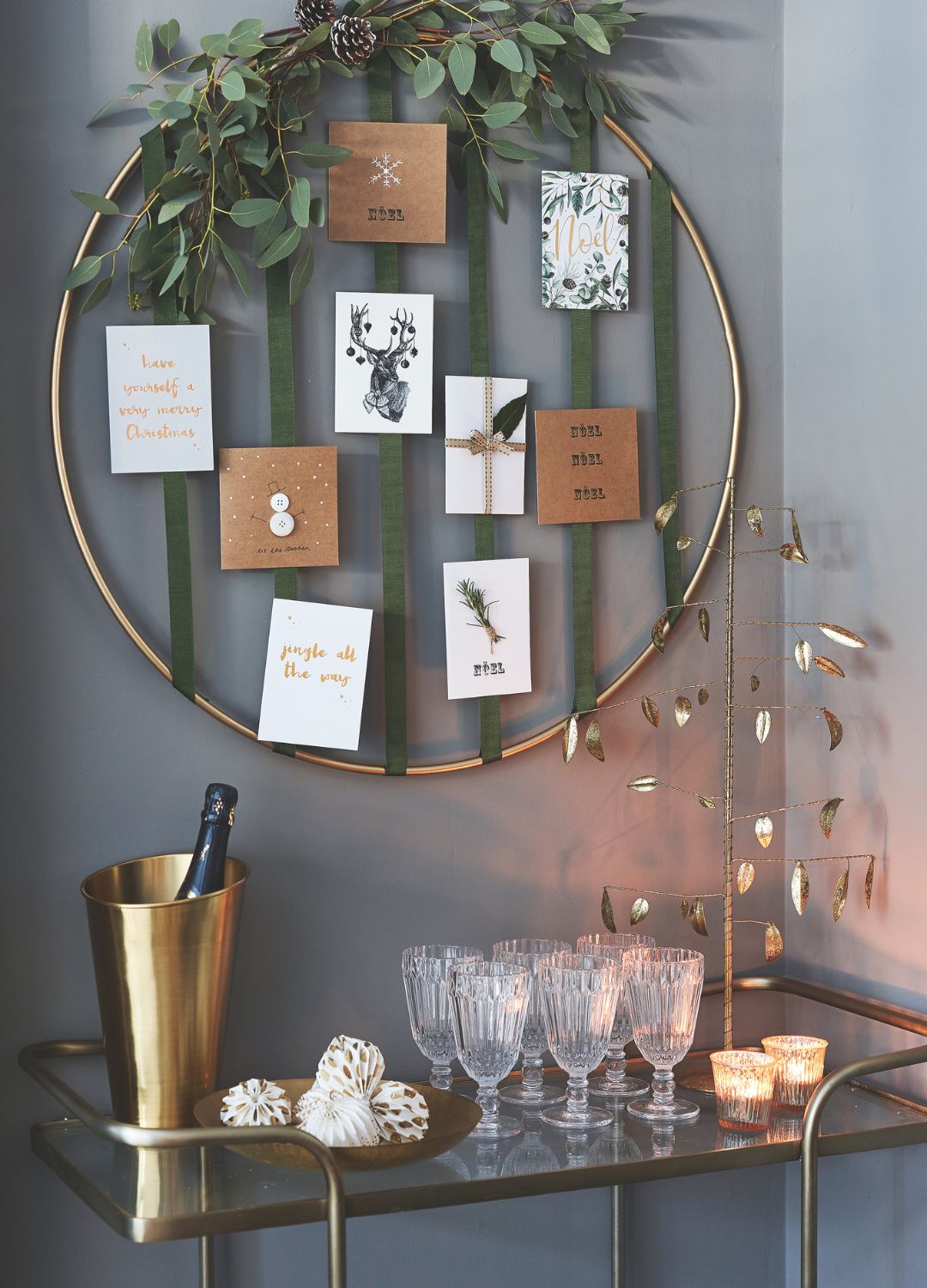 picture of bar cart with glasses and bottle of prosecco