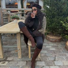 Lena wearing leopard print coat