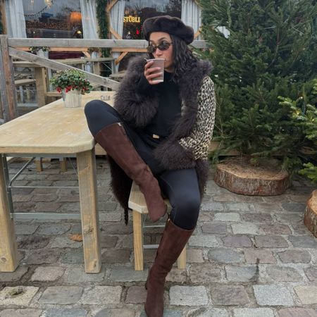 Lena wearing leopard print coat