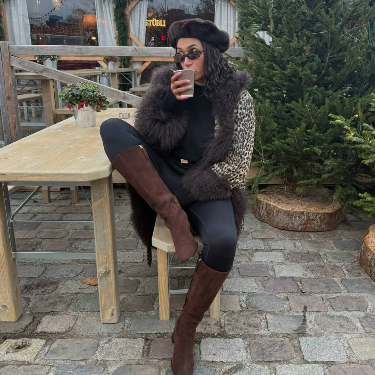 Lena wearing leopard print coat