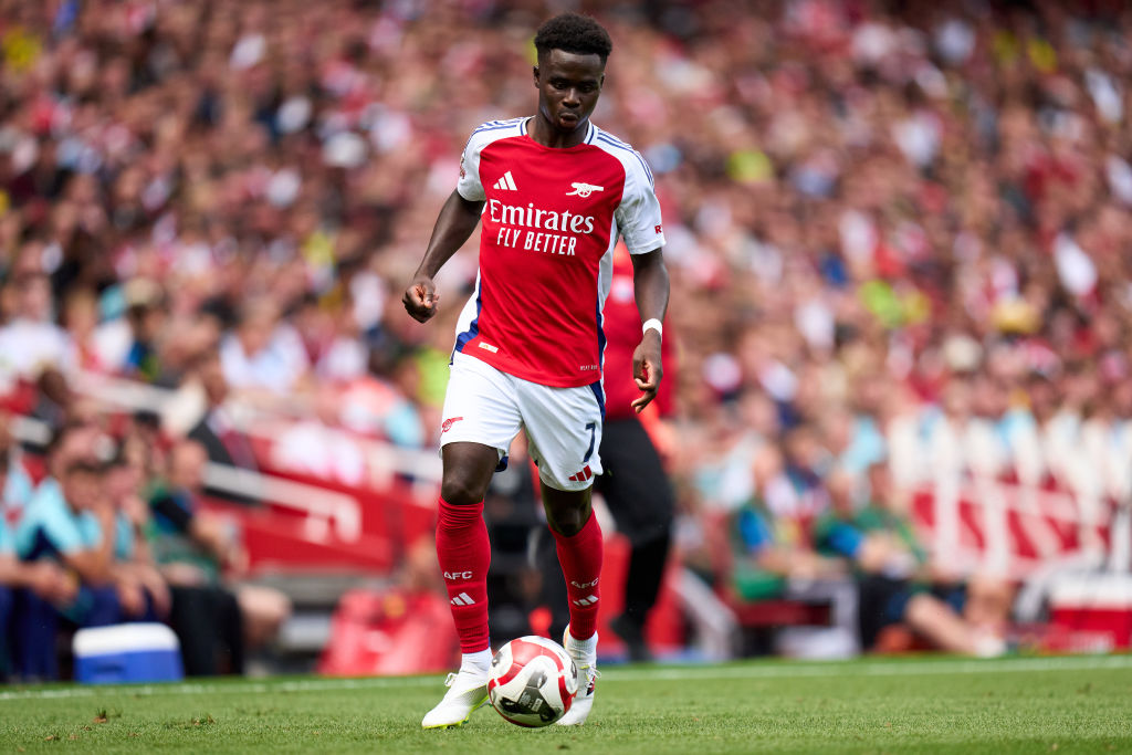 Arsenal squad for 2024/25 LONDON, ENGLAND - AUGUST 11: Bukayo Saka of Arsenal runs with the ball during the pre-season friendly match between Arsenal and Olympique Lyonnais at Emirates Stadium on August 11, 2024 in London, England. (Photo by Angel Martinez/Getty Images)