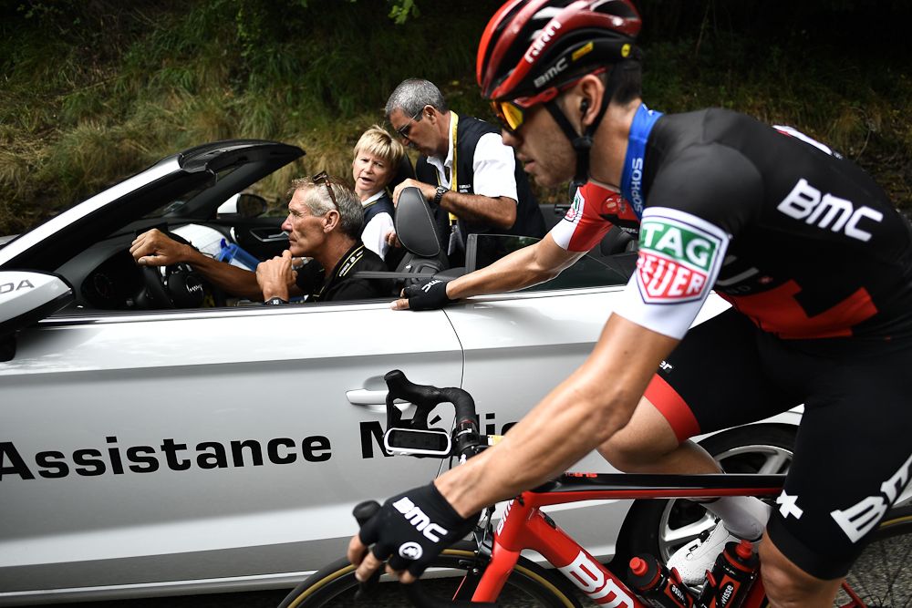 BMC Racing's Paddy Bevin checks in the medical car before abandoning the Tour de France