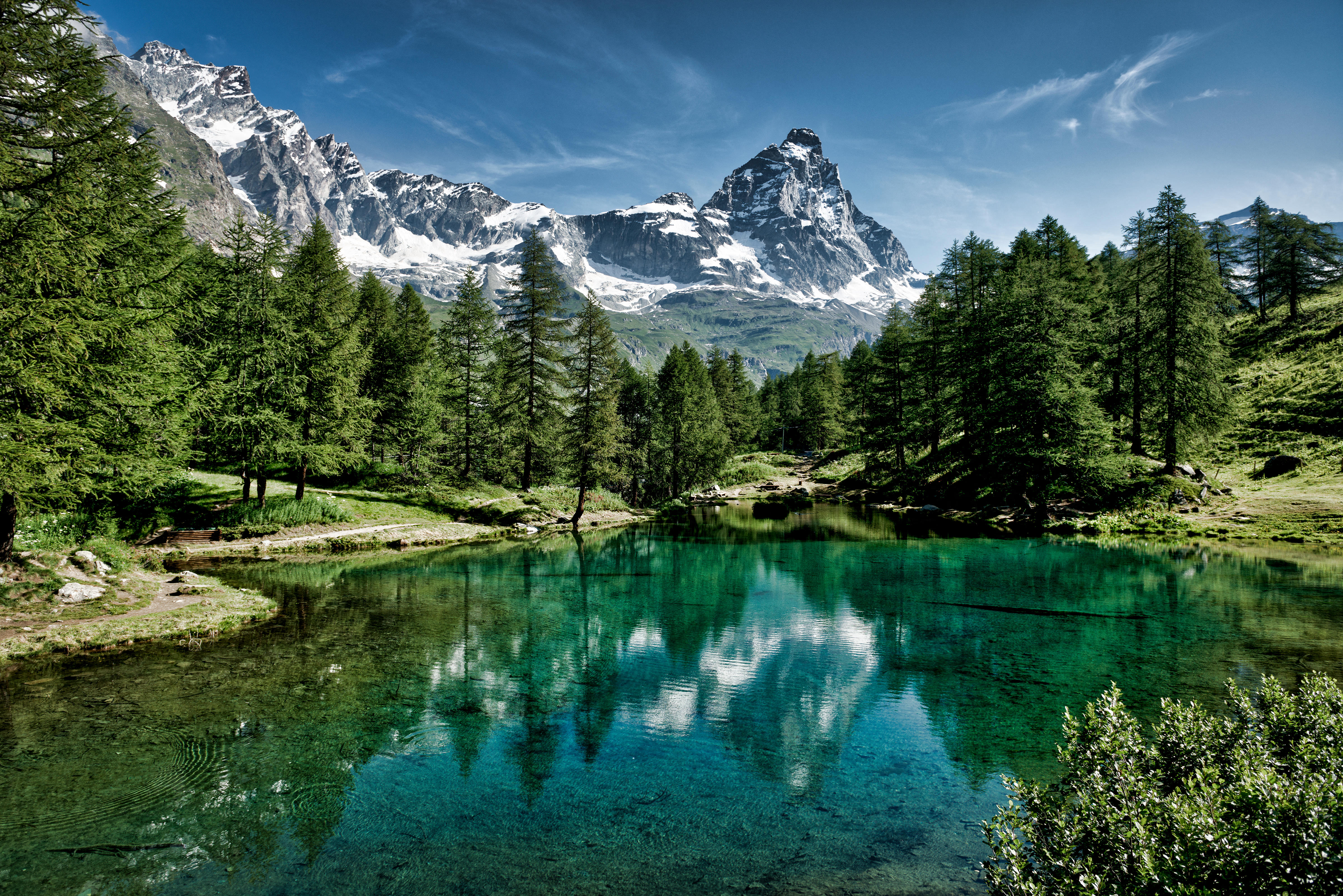 Blue lake and the Matterhorn in a scenic summer landscape