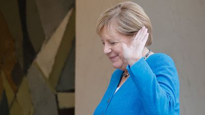 Angela Merkel waving