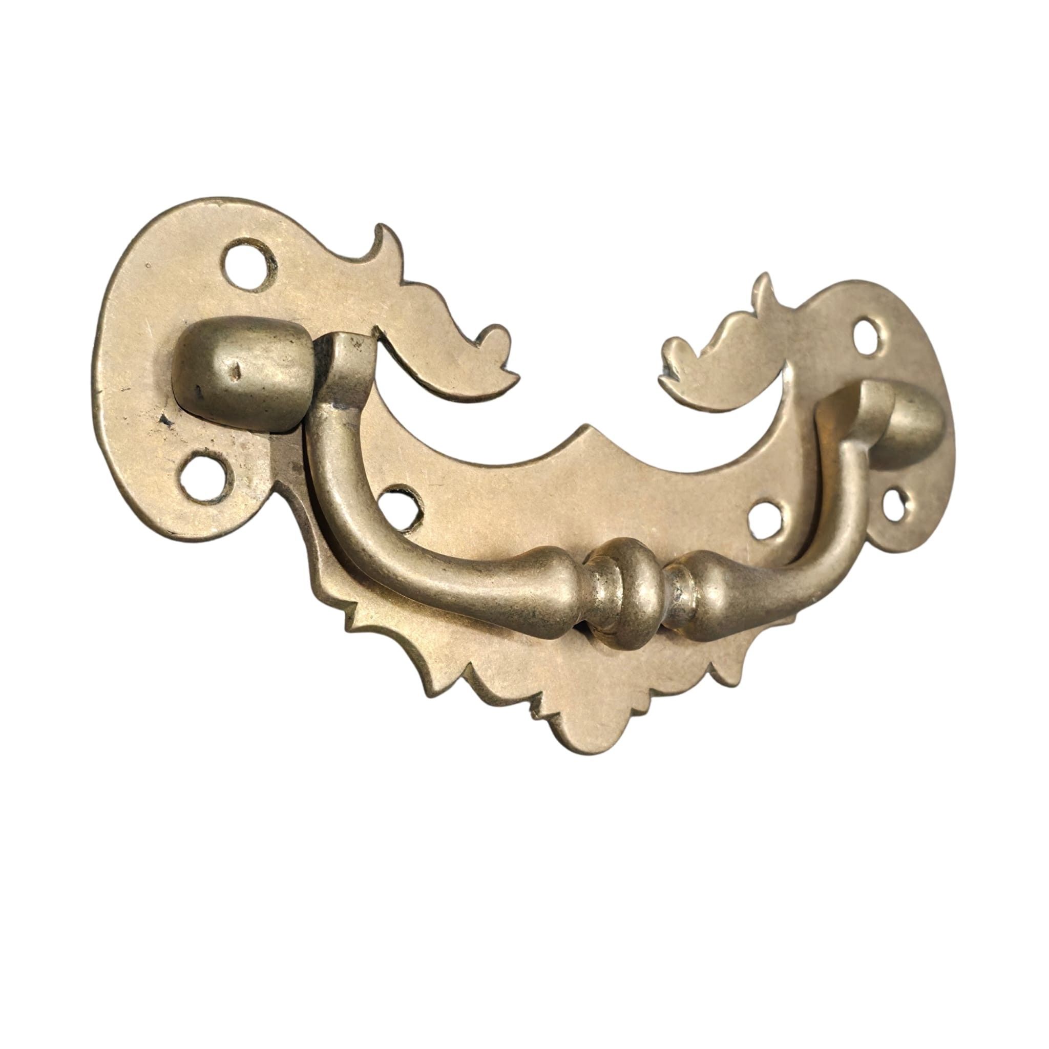 Brass handle on a white background