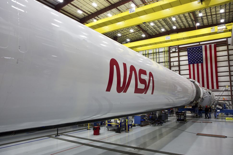 NASA's famous 'worm' logo crawls back into action on SpaceX rocket